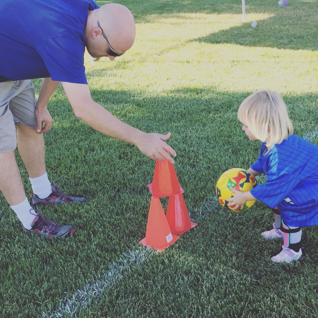 Daddy and daughter in a blog post about the Kidz Love Soccer Mommy/Daddy & Me class in Paso Robles California from Two In Tow & On The Go.