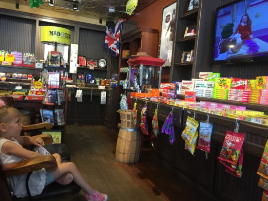 Here is a photo of a 3 year old eating candy at SLO Sweets in Downtown Paso Robles. Things to do with Kids in Downtown Paso Robles.