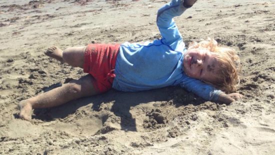 Taking a baby to Cayucos State Beach in California.