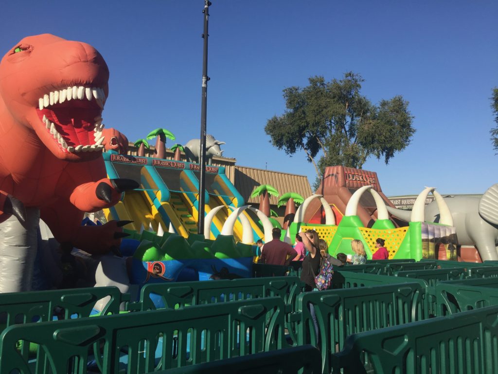 Jurassic Quest Paso Robles bounce house line Tonya Strickland
