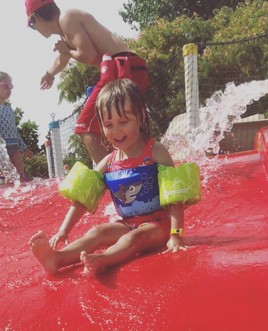 Kid on a waterslide