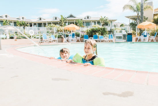 Two kids swimming Review of Avila Lighthouse Suites, Avila Beach