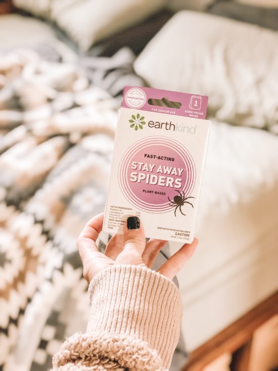 EarthKind Stay Away Spider Repellant next to bed