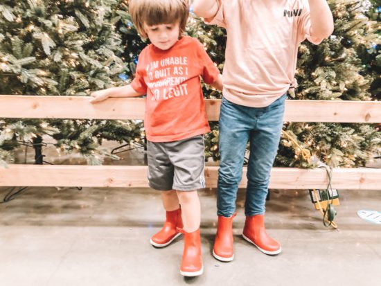 Bobux Paddington Red Boots closeup next to christmas trees