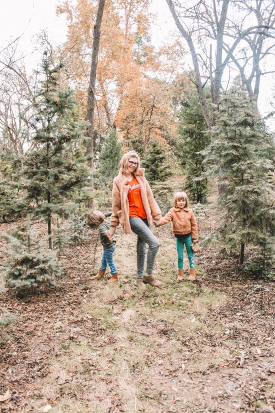 family at christmas tree farm