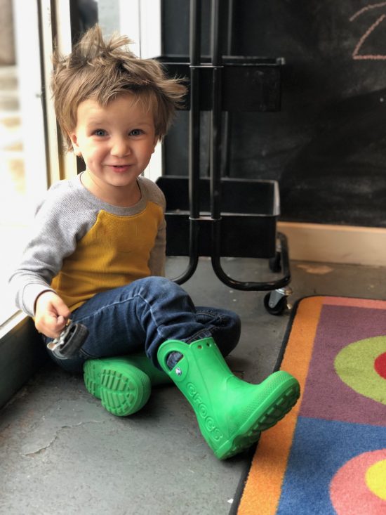 boy in green boots