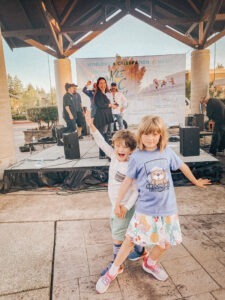 two kids near a stage