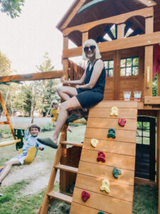 mom and son on swingset