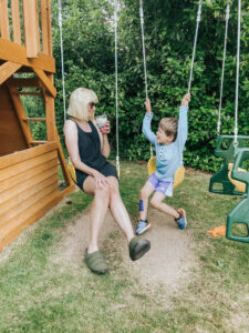 mom and son on swings