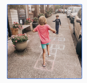 hopscotch squares in chalk on sidewalk 