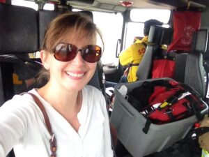 girl in sunglasses in firetruck