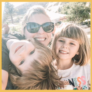 mom with boy and girl with smiles and hair