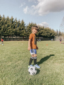 kid with soccer ball